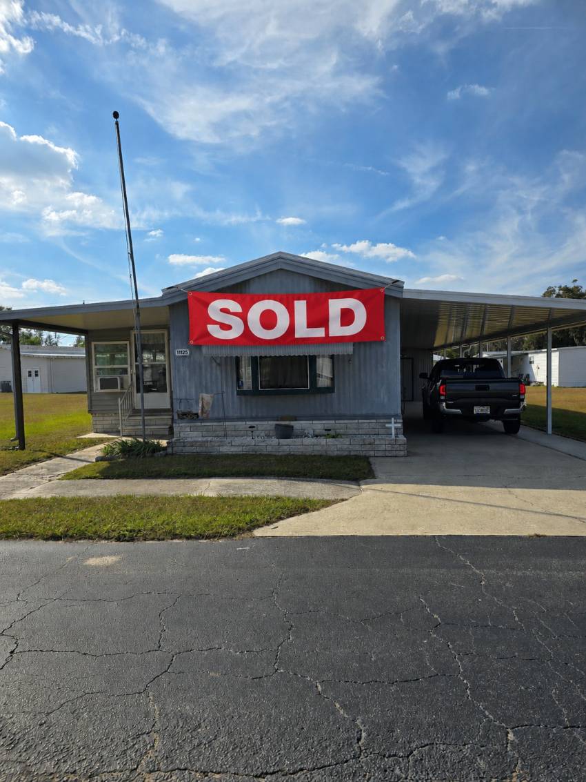 Dade City, FL Mobile Home for Sale located at 11125 Mockingbird Lane Harmony Heights Community